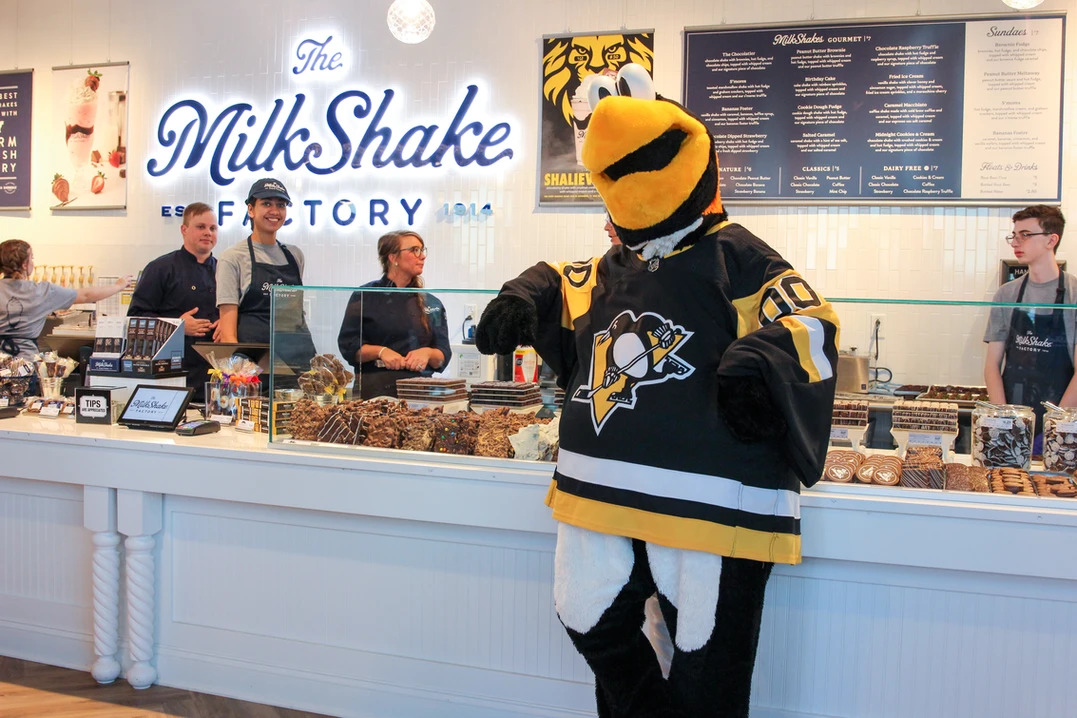 pittsburgh penguins hockey team mascot in milkshake factory store