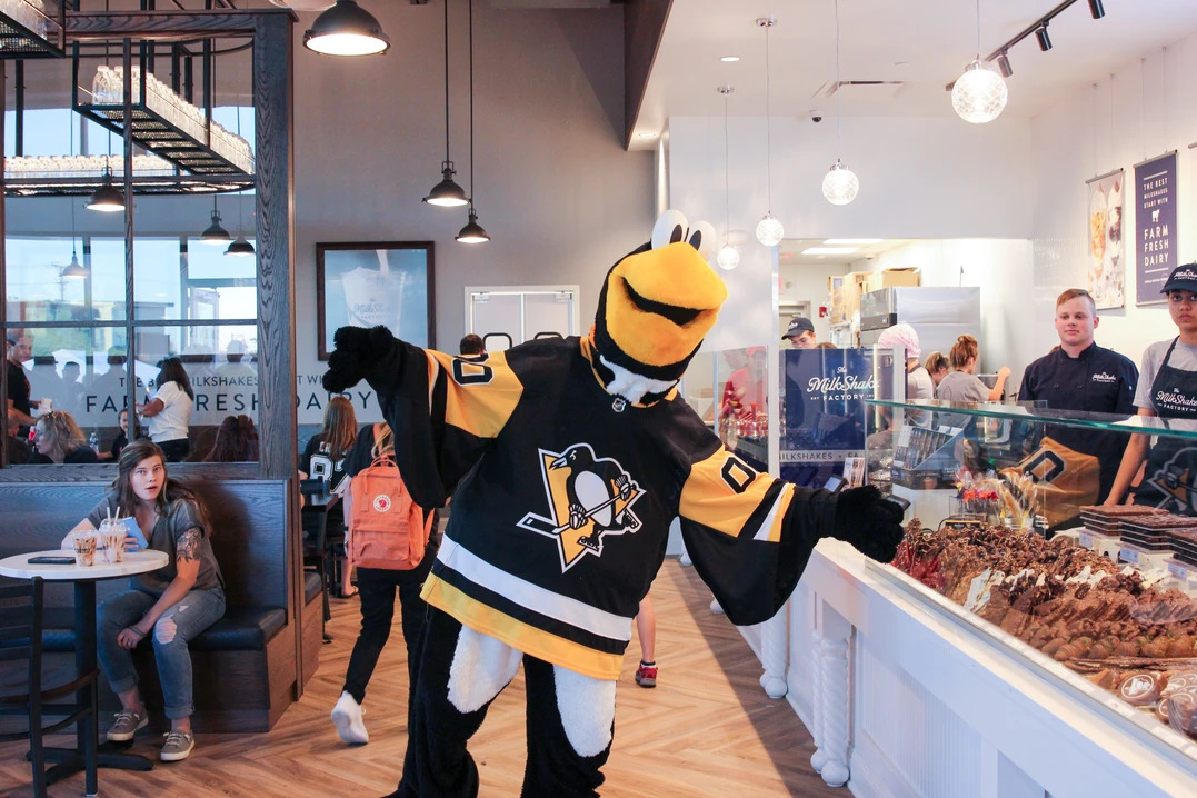 pittsburgh penguins hockey team mascot in milkshake factory store